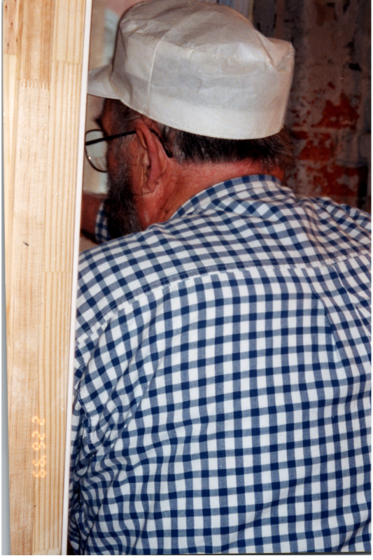 Roy Kolas helps with construction