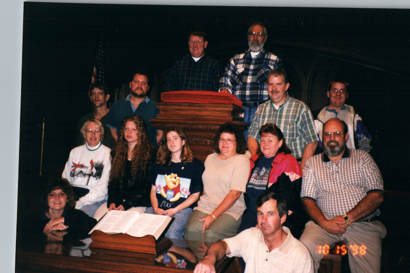 A group smiles together in Highway's sanctuary