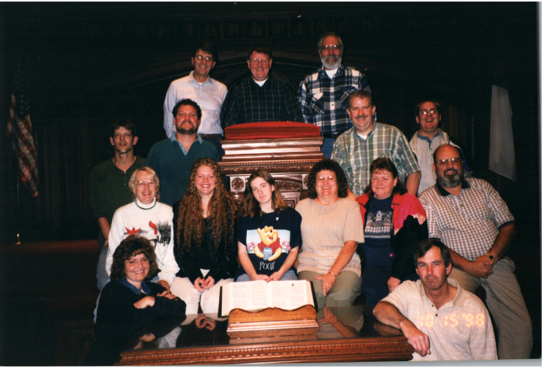 A group smiles together in Highway's sanctuary