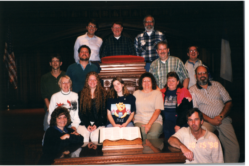 A group smiles together in Highway's sanctuary