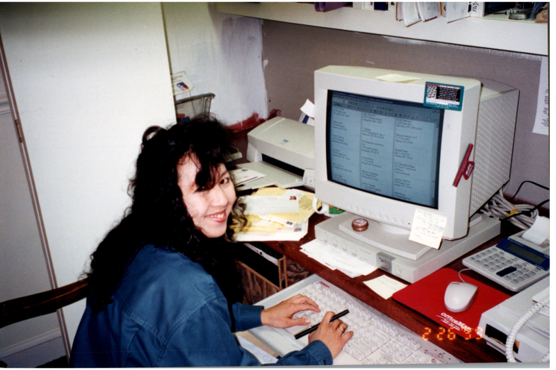 Ginny Vega works at a computer