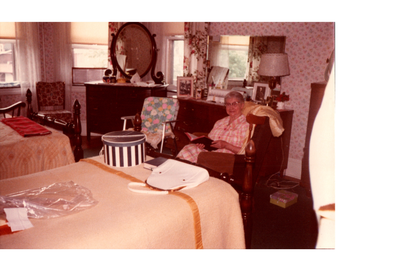 Woman in a shared Highway Home for the Aged bedroom