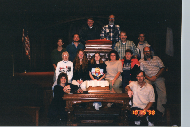 A group smiles together in Highway's sanctuary