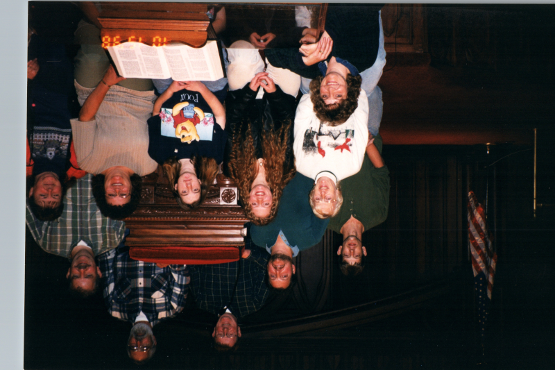 A group smiles together in Highway's sanctuary