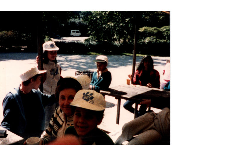 Group gathers under a pavillion