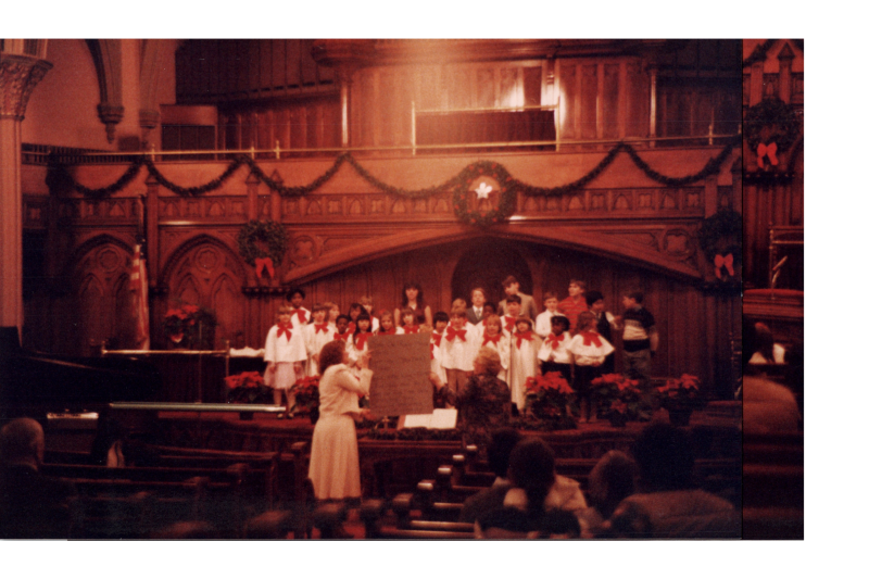 Children sing together as a choir
