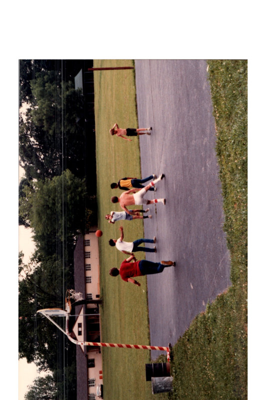 Men play basketball