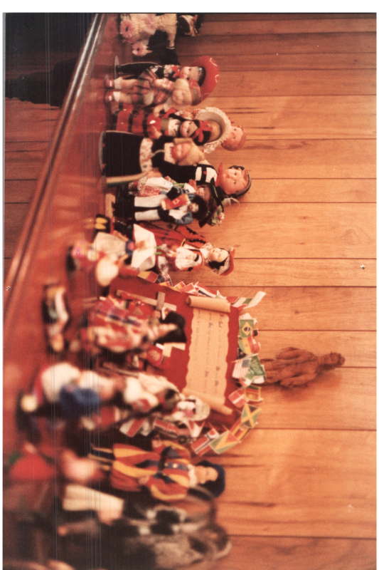 A display of international dolls and flags