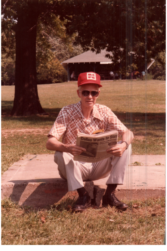 A man reads a newspaper