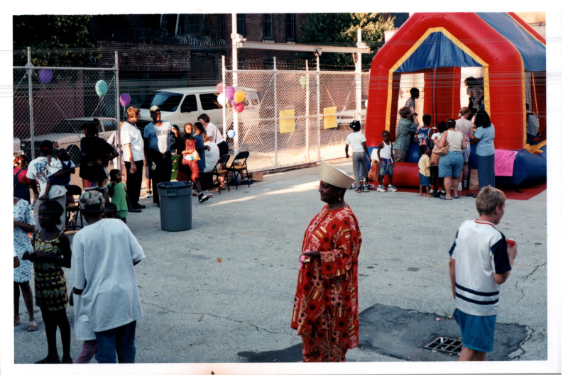 Children play in a parking lot