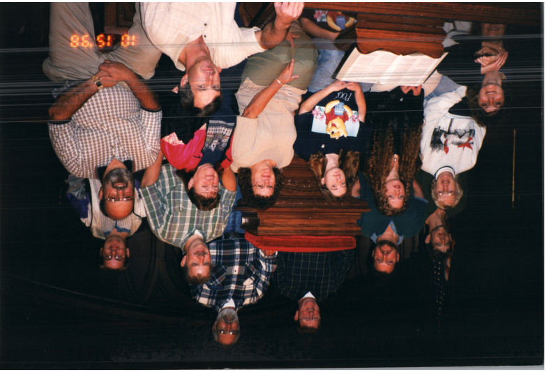 A group smiles together in Highway's sanctuary