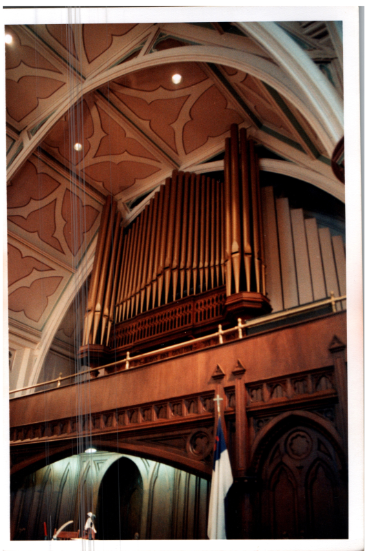 A woman plays the organ in Highway's sanctuary