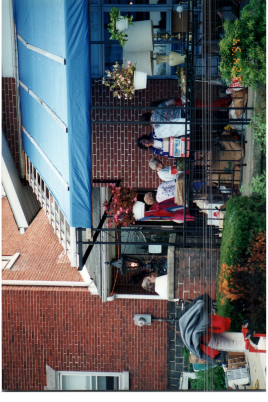 Residents walk around an outdoor space