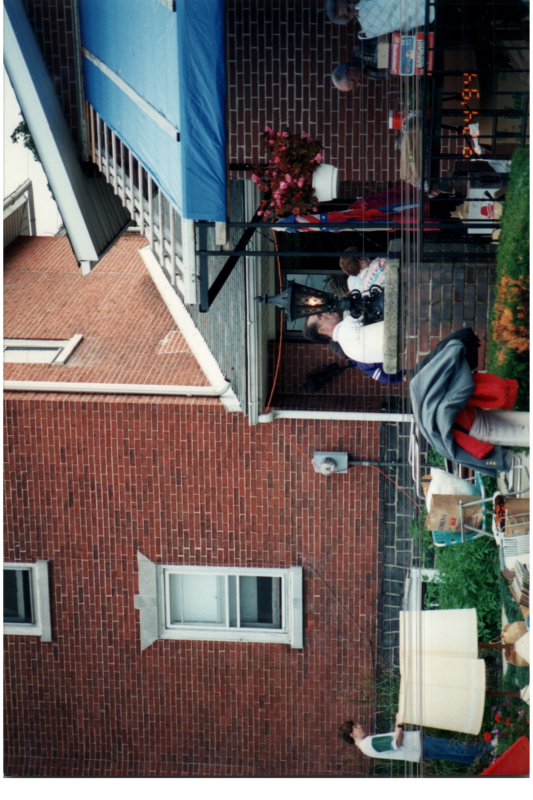 Residents walk around an outdoor space