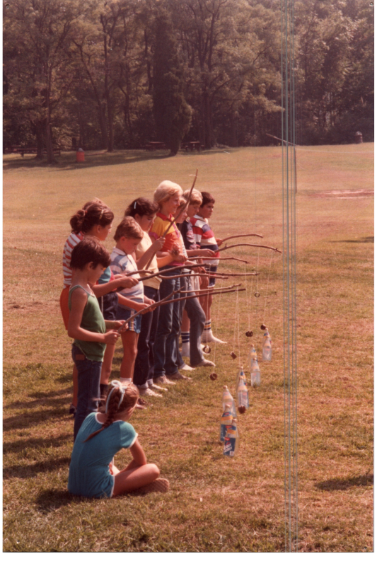 Children play a fishing game