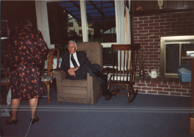 Pastor Roberson speaks to a woman