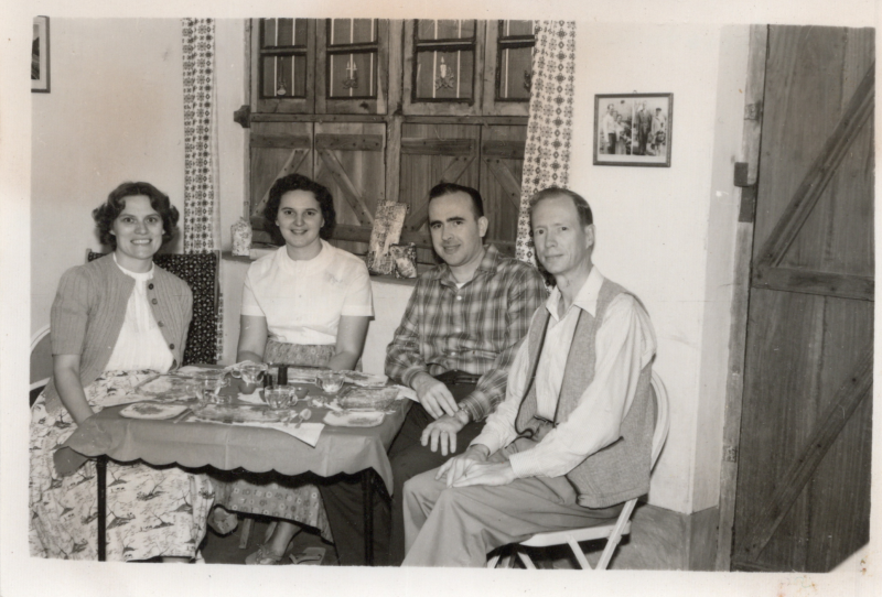 Image of the Olsons, missions to Pakistan, with the caption, "Christmas dinner 1962, Marion Olson, Ruth Tarno, Don Tarno, and Calvin Olson in our home in Golpalganj"