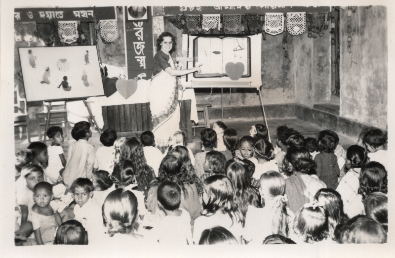 Image from the Olsons, missionaries to Pakistan, captioned, "Kids Krusade, Jan. 1968, Marian Leading Opening Session, Golpaganj"
