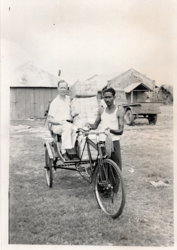 Image from the Olsons, missionaries to East Pakistan, captioned, "Calvin with 40,000 gospel tracts in the Bengali language just arriving at the mission house in Khulna from the printers. Fall- 1962"