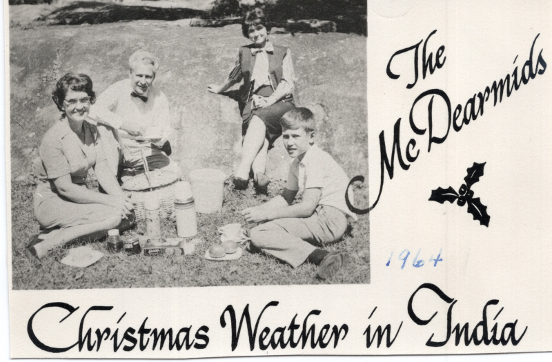 Card with a photgraph of the McDearmids in warm weather clothing reading, "Christmas Weather in India"