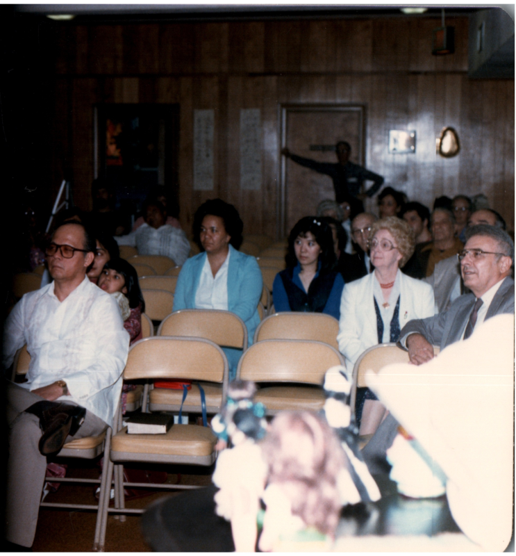 The congregation faces a stage