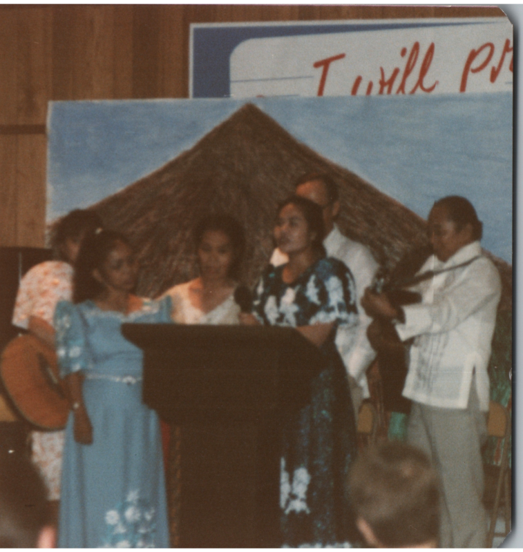 A group sings and plays music together