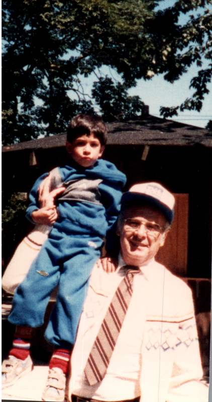Pastor Bogdan holds a young boy