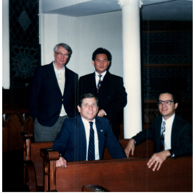 A group talks together in the sanctuary