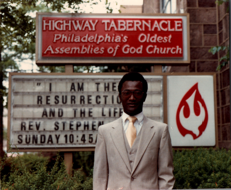 Portrait of Cornelius Essien, graduate student at the University of Pennsylvania from Nigeria, outside of Highway