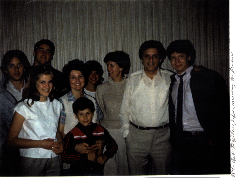 Group with the caption, "19840 Get-together before moving to (illegible)"