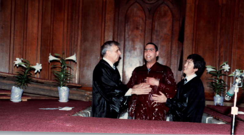 A man is baptized