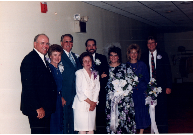 Portrait, left to right: "Sandgrens, Keils, Brad and Brenda, Loretta (Maid-of-honor from Kenya), Larry (Best man)"