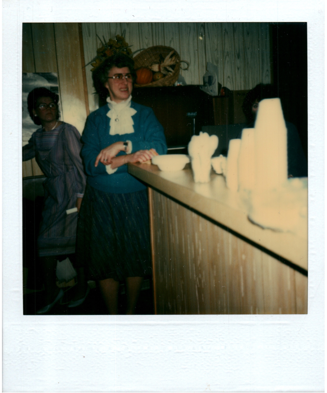 A woman smiles for a photo