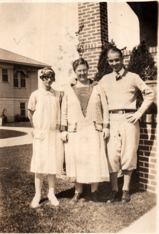 Portrait of two women and a man
