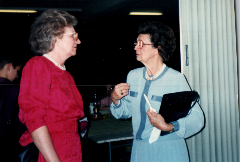 Betty Roberson speaks with a woman