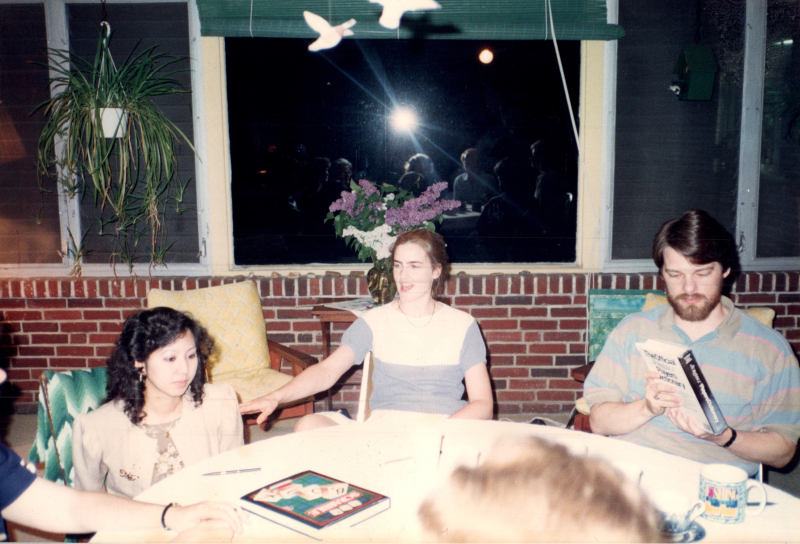 Kierstin sitting around a table with others, including Ginny Vega