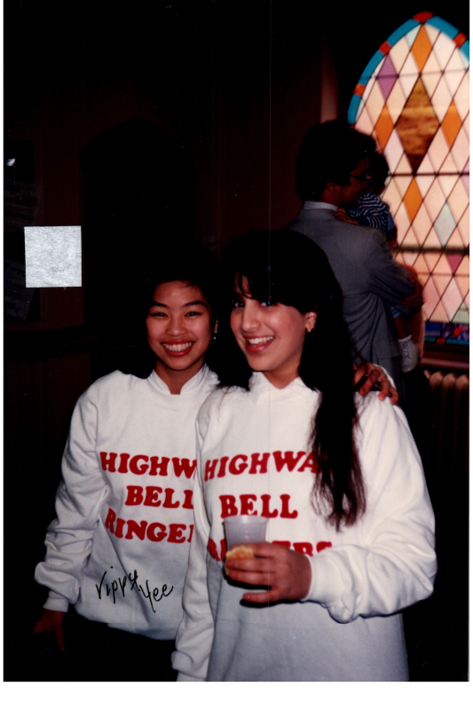 Vippy Yee and another girl smile togerther in "Highway Bell Ringers" sweatshirts