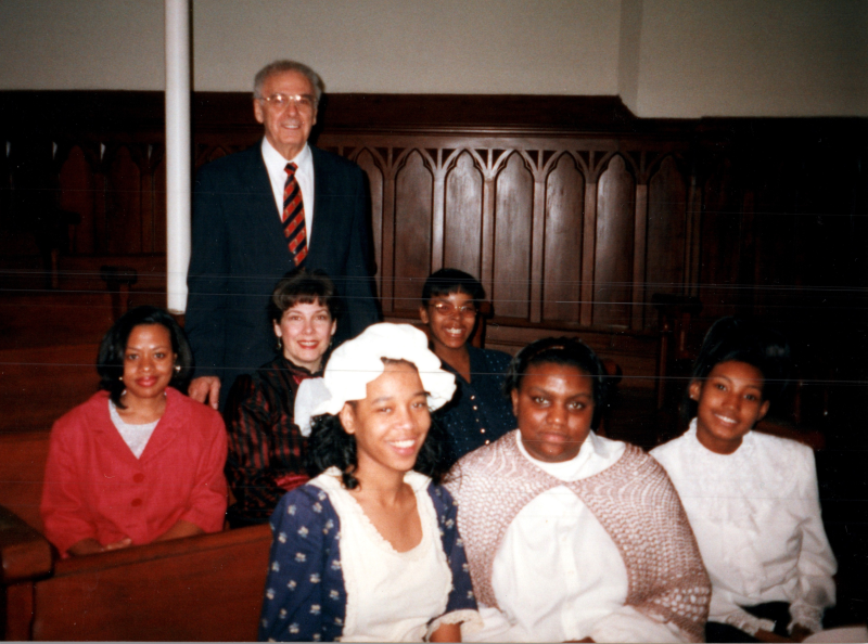 Cast of The Sable Sisters smile with other congregants and Pastor Bogdan