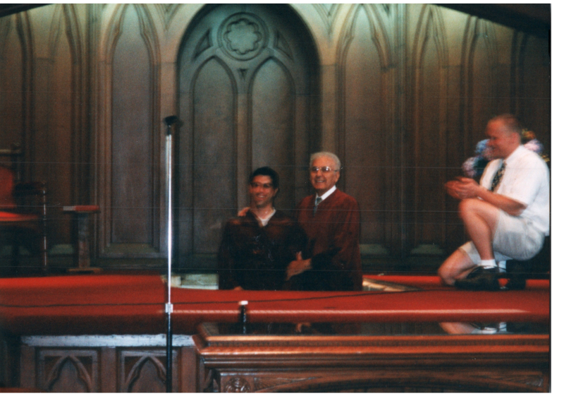 Pastor Bogdan baptizes a young man