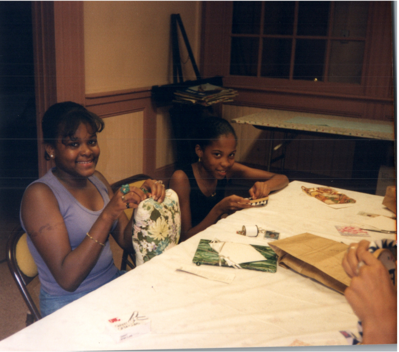Two girls do crafts together