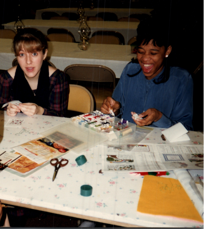 Two girls do crafts together