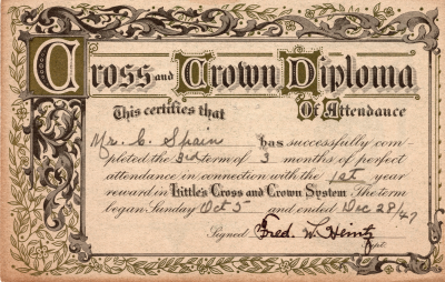 Recognizes perfect attendance by Ms. Spain in the third three months of the first year of the Cross and Crown System, signed by Fred W. Heinz