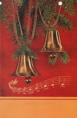 Front cover: A photograph of bells strung on pine needles and a line of music with the lyrics of Joy to the World