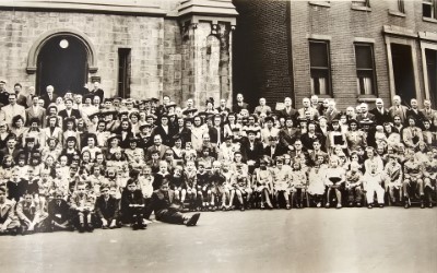 Third of four image slices with a group of congregants outside the building at 19th and Green Streets