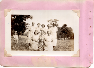 Group picture of several women smiling together